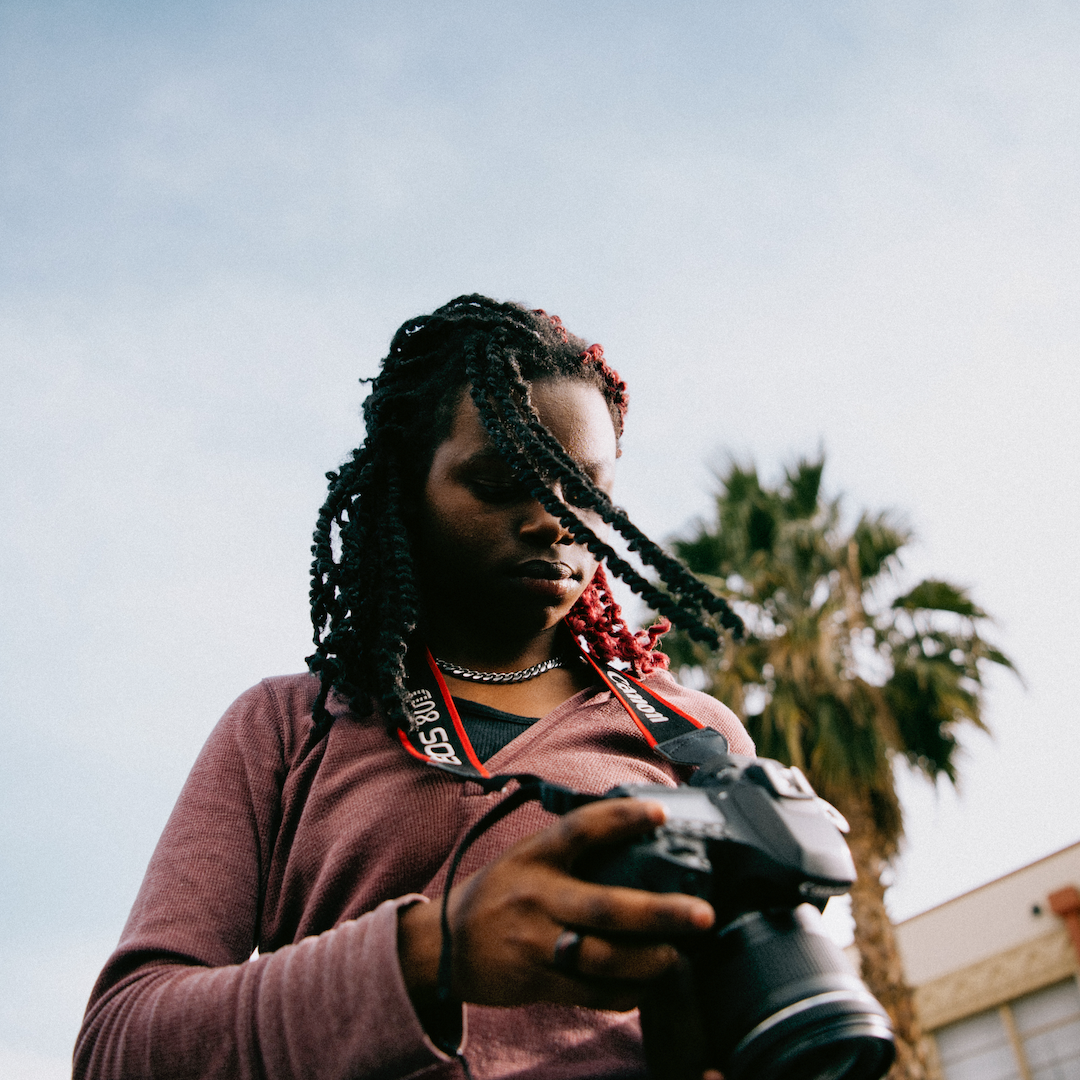 teen reviews photos she's taken on her camera